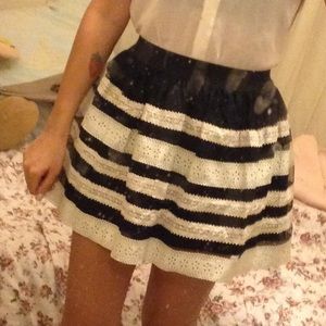 Black skirt with white leather stripes